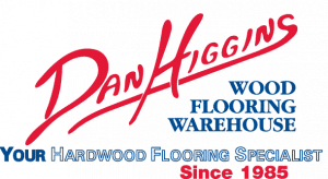 Red and blue logo for Dan Higgins Wood Flooring Warehouse.