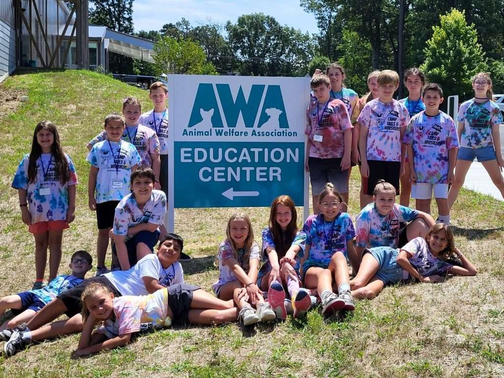 AWA campers taking group photo outside of Education Center.