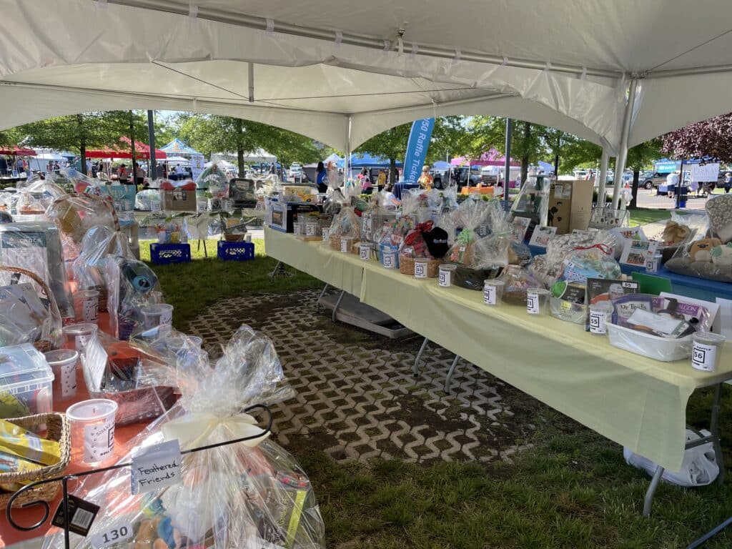 Tent full of gift baskets for AWA Paws & Feet 2022 basket raffle