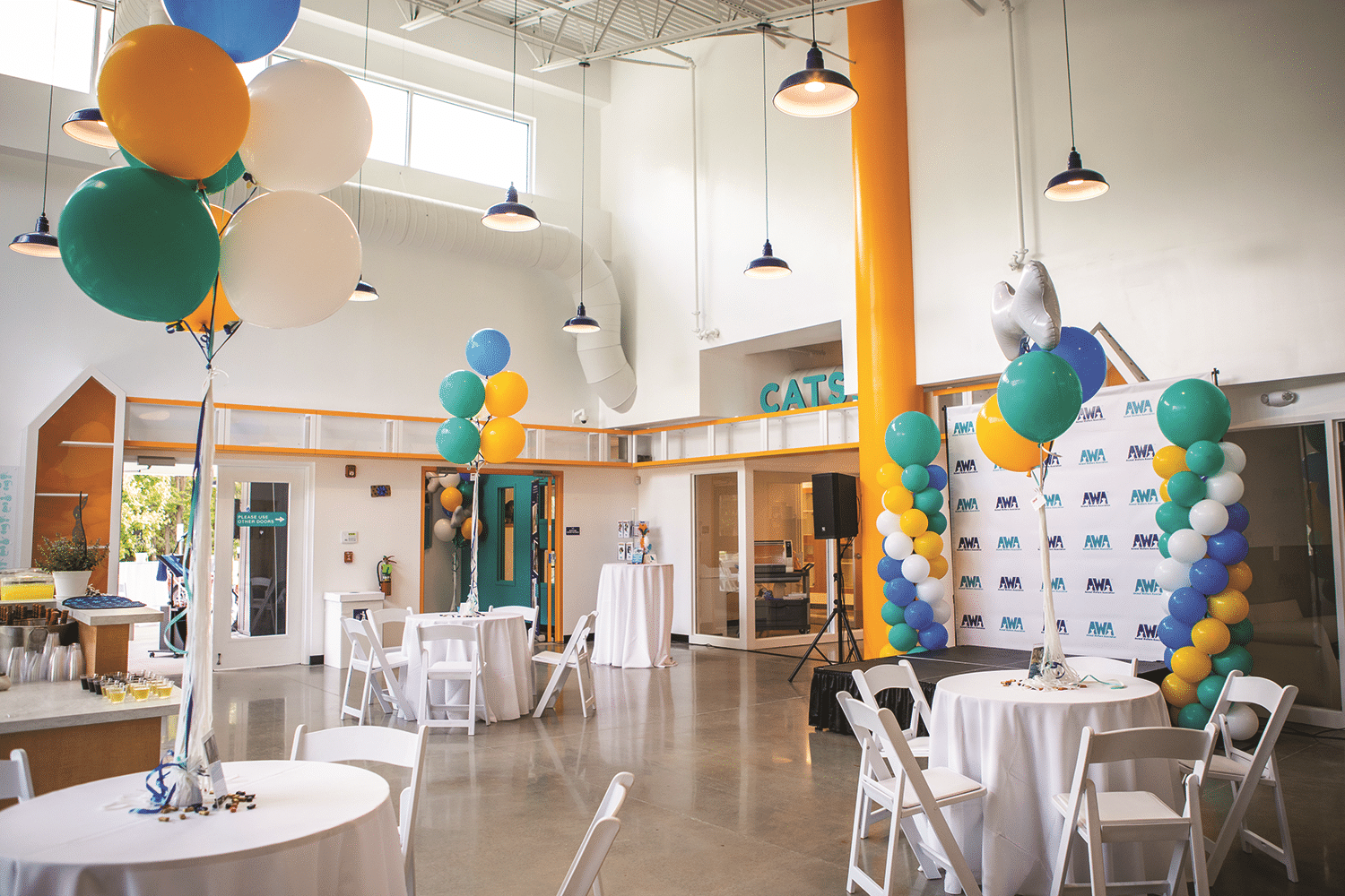 Animal Welfare Association lobby decorated with charis, tables and balloons for party and event rental.